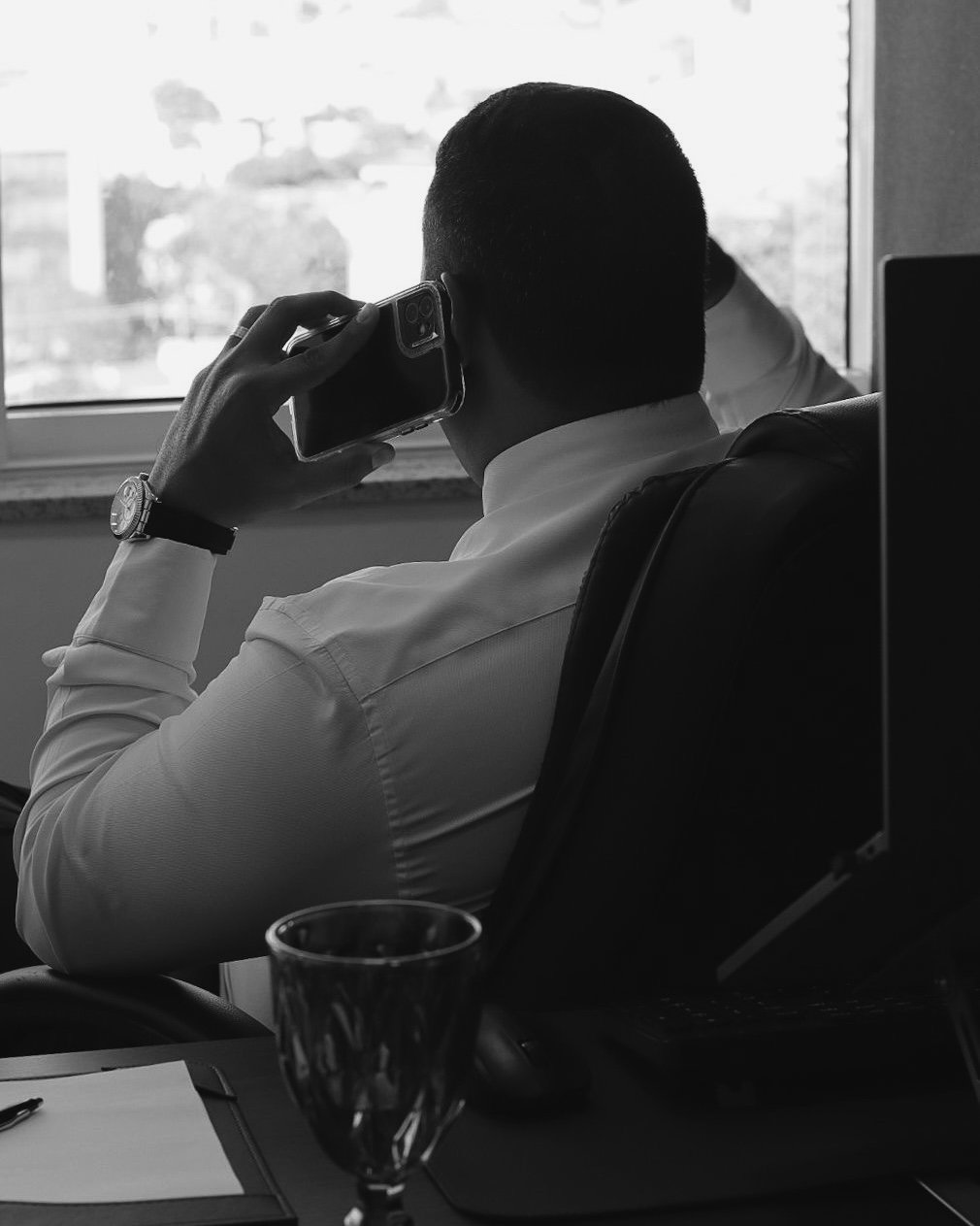 Founder on a phone before a board meeting for wardrobe management services