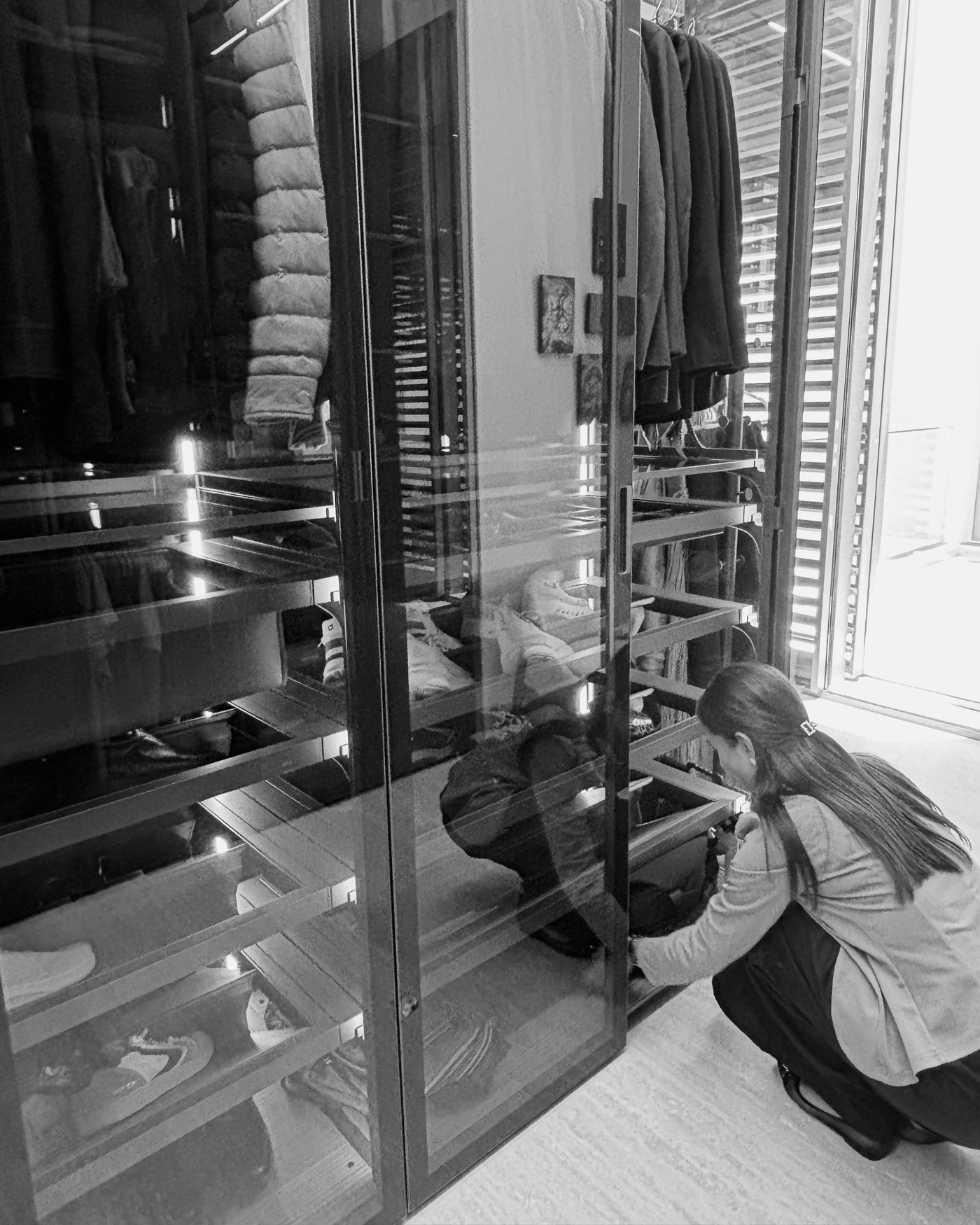Wardrobe audit and digital cataloguing inside a luxury closet