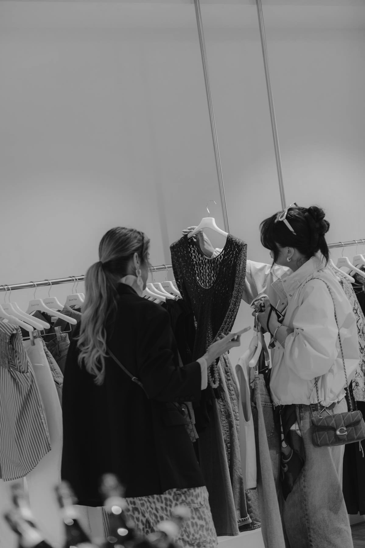 Two women reviewing garments during a personal colour and wardrobe consultation